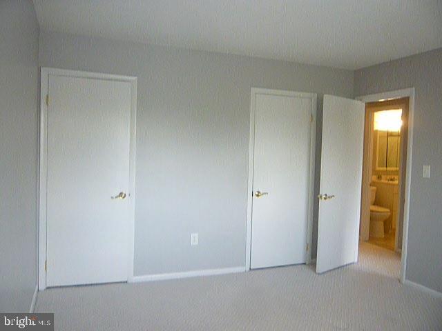 3356 Hewitt Avenue, Unit 202 Silver Spring, MD 20906 - Photo 36 of 49 Whole Wall of Closets in Primary Bedroom