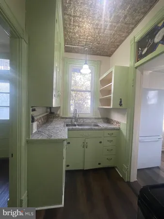 a view of a kitchen from a sink
