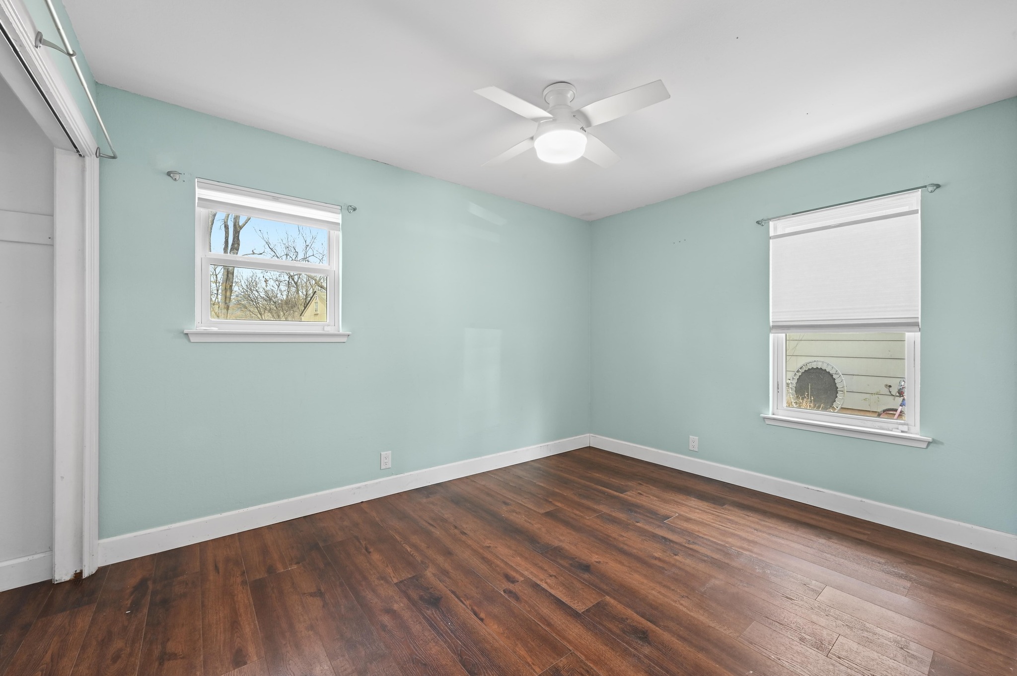 6302 Thurgood Avenue Austin, TX 78721 - Photo 15 of 31 a view of empty room with wooden floor and fan