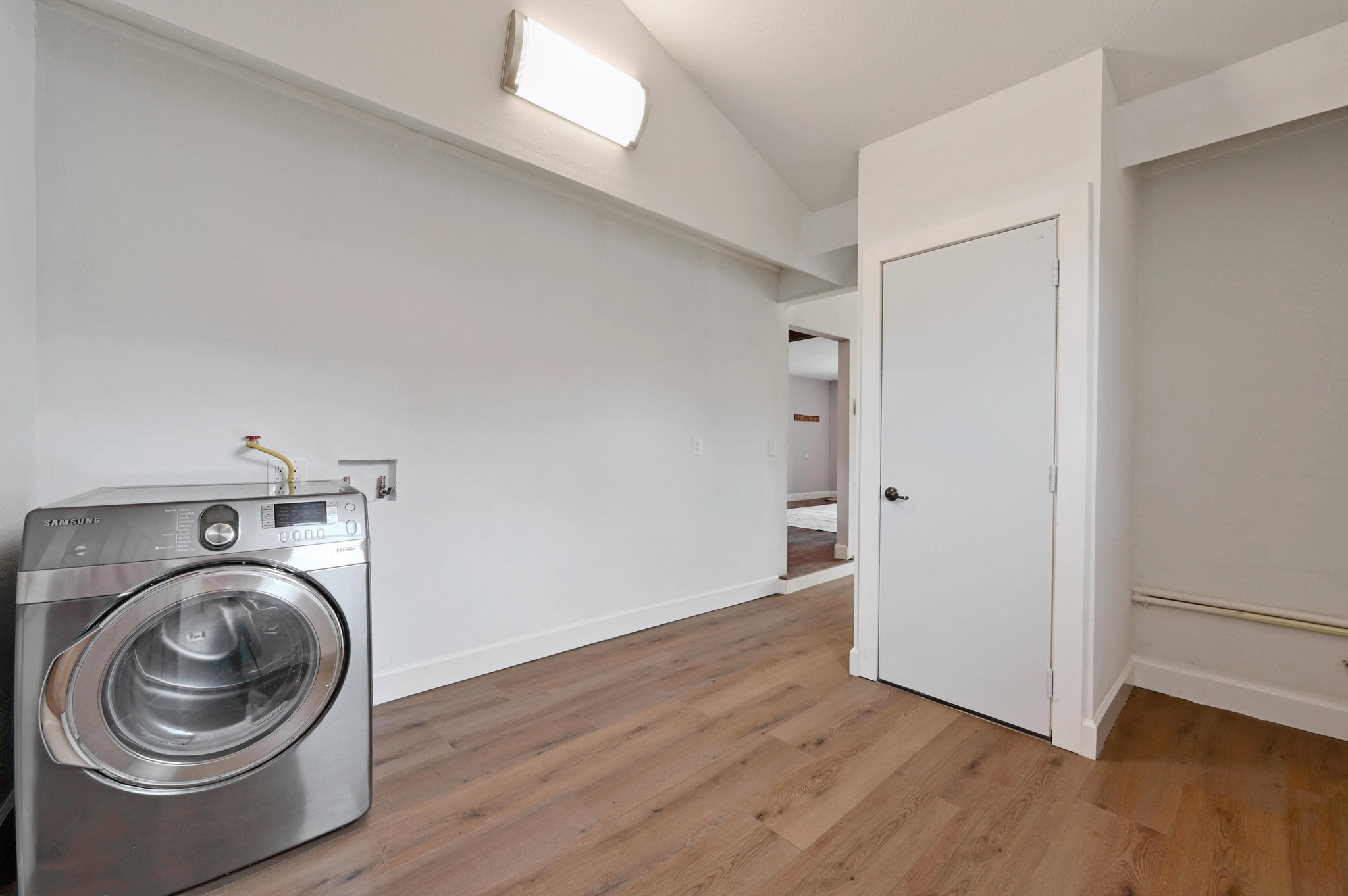 6302 Thurgood Avenue Austin, TX 78721 - Photo 21 of 31 a view of a storage & utility room with washing machine