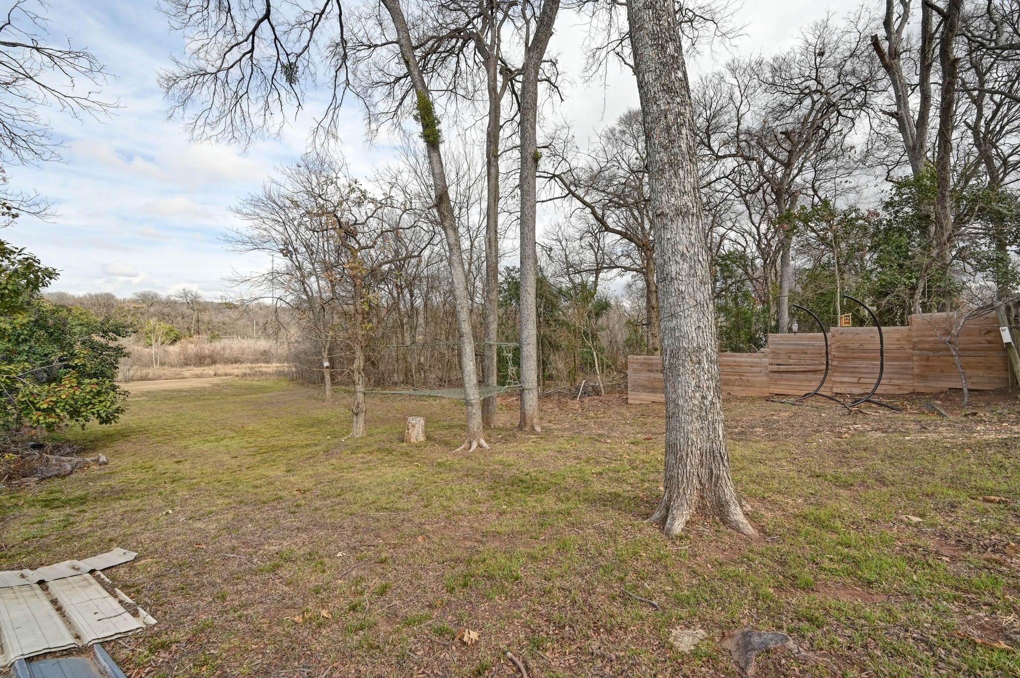 6302 Thurgood Avenue Austin, TX 78721 - Photo 25 of 28 View of yard with Boggy Creek below in the distance.