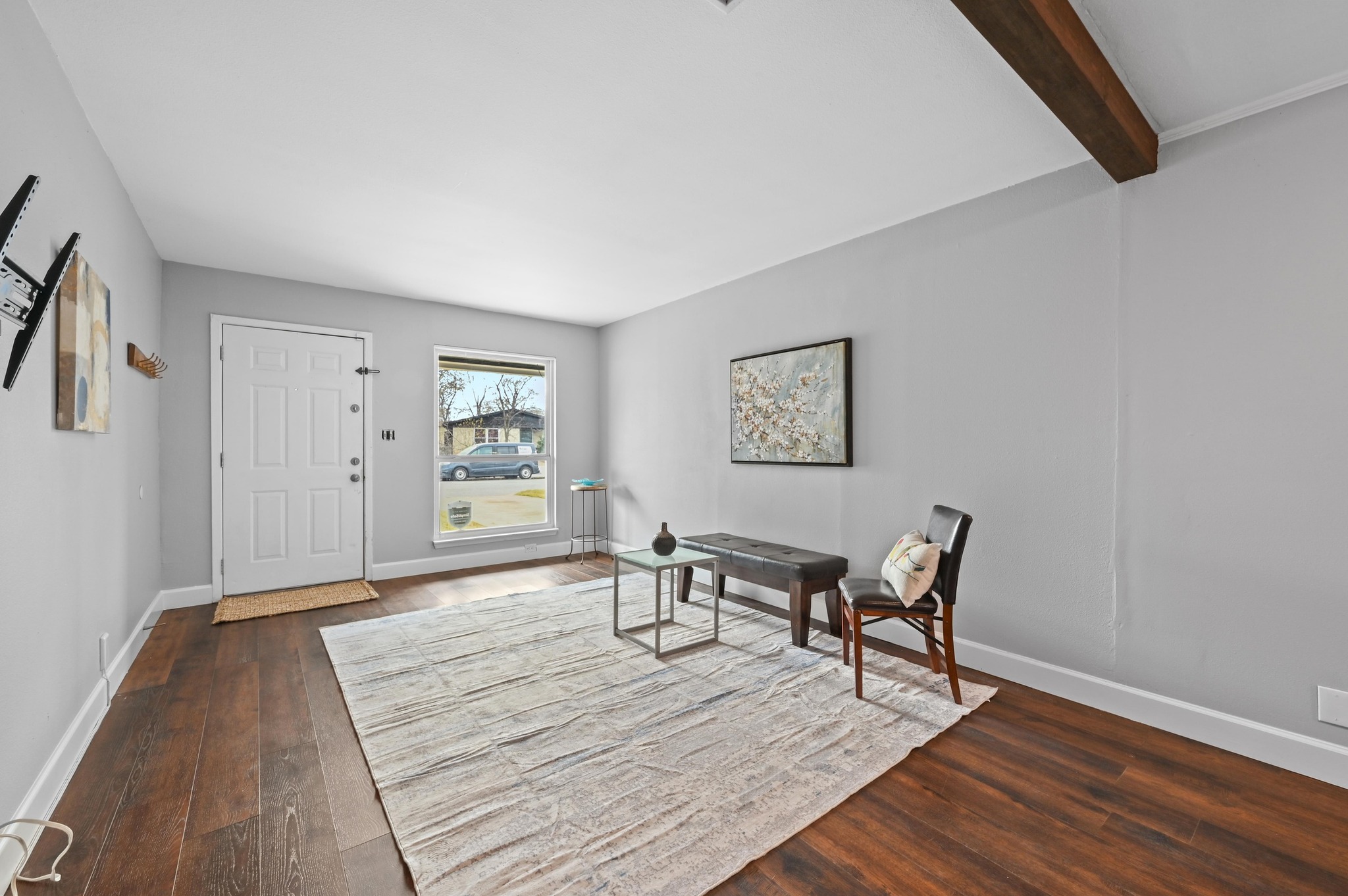 6302 Thurgood Avenue Austin, TX 78721 - Photo 8 of 31 a living room with wooden floor and furniture