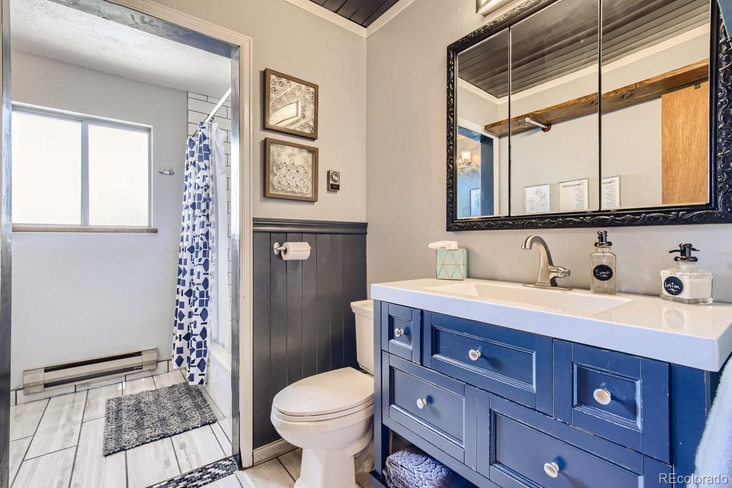44 Bandit Lane Bailey, CO 80421 - Photo 14 of 30 a bathroom with a sink toilet and shower