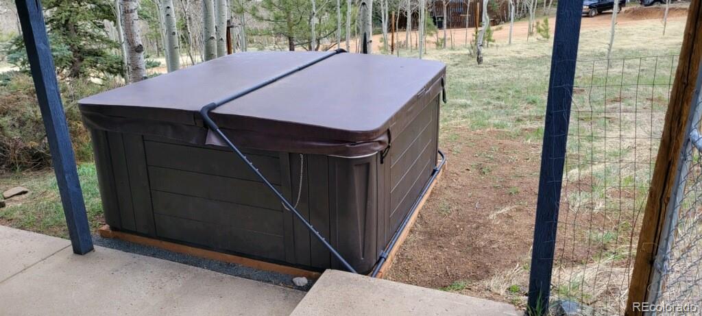 44 Bandit Lane Bailey, CO 80421 - Photo 30 of 30 a patio with table and chairs