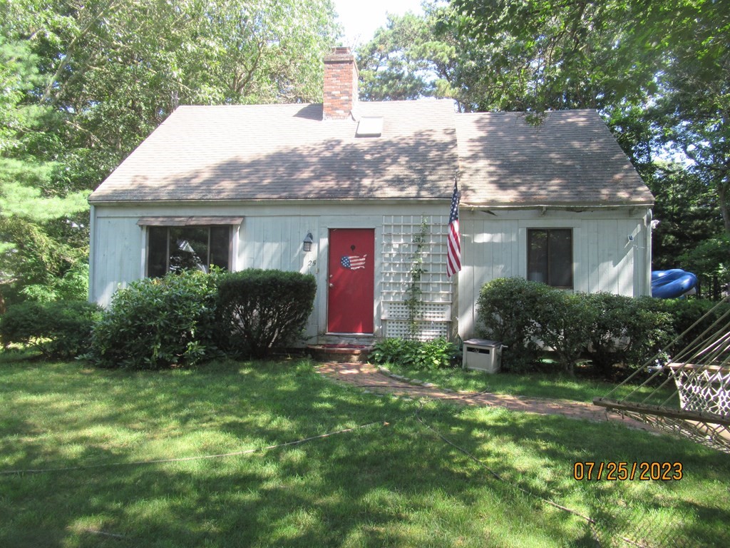 25 Marway Mashpee, MA 02649 - Photo 2 of 2 a view of front of house with a yard