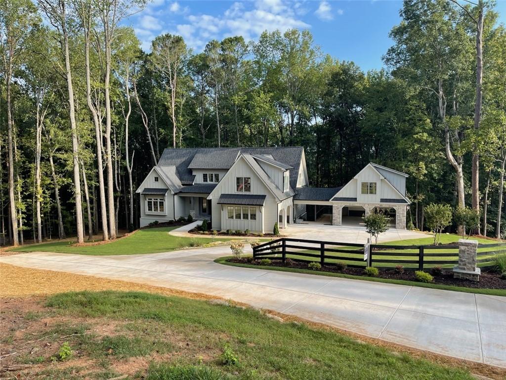 388 Hickory Pass Milton, GA 30004 - Photo 1 of 1 a front view of a house with a yard