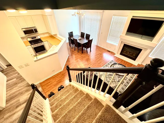 a view of a living room and dining room