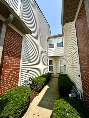 a view of a back yard of the house
