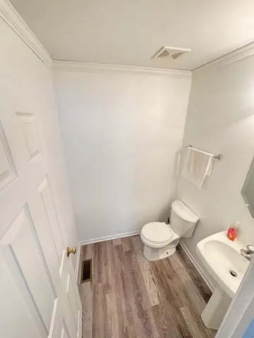 a bathroom with a sink and a toilet