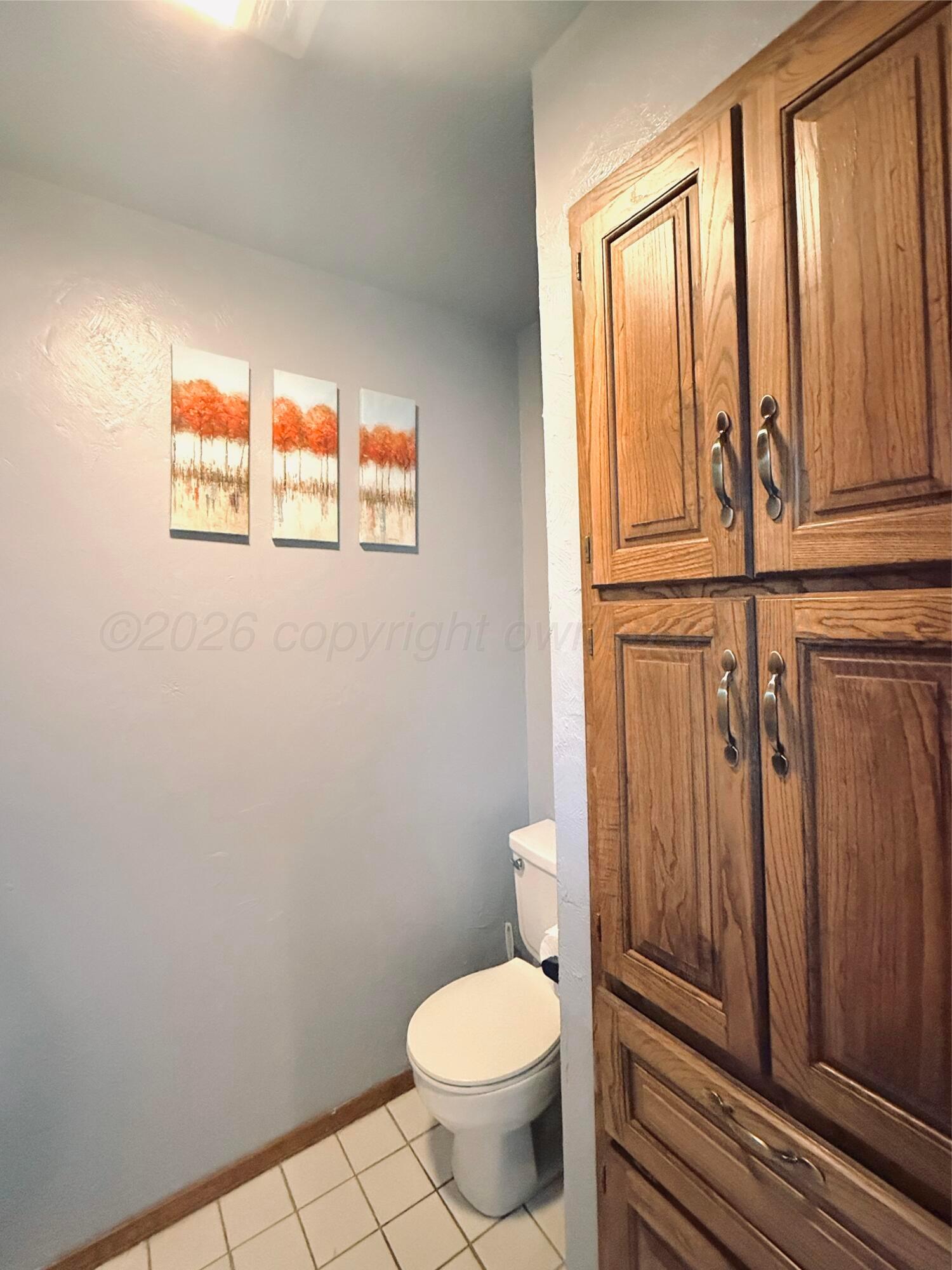 2005 Lister Street Borger, TX 79007 - Photo 11 of 20 a bathroom with a toilet