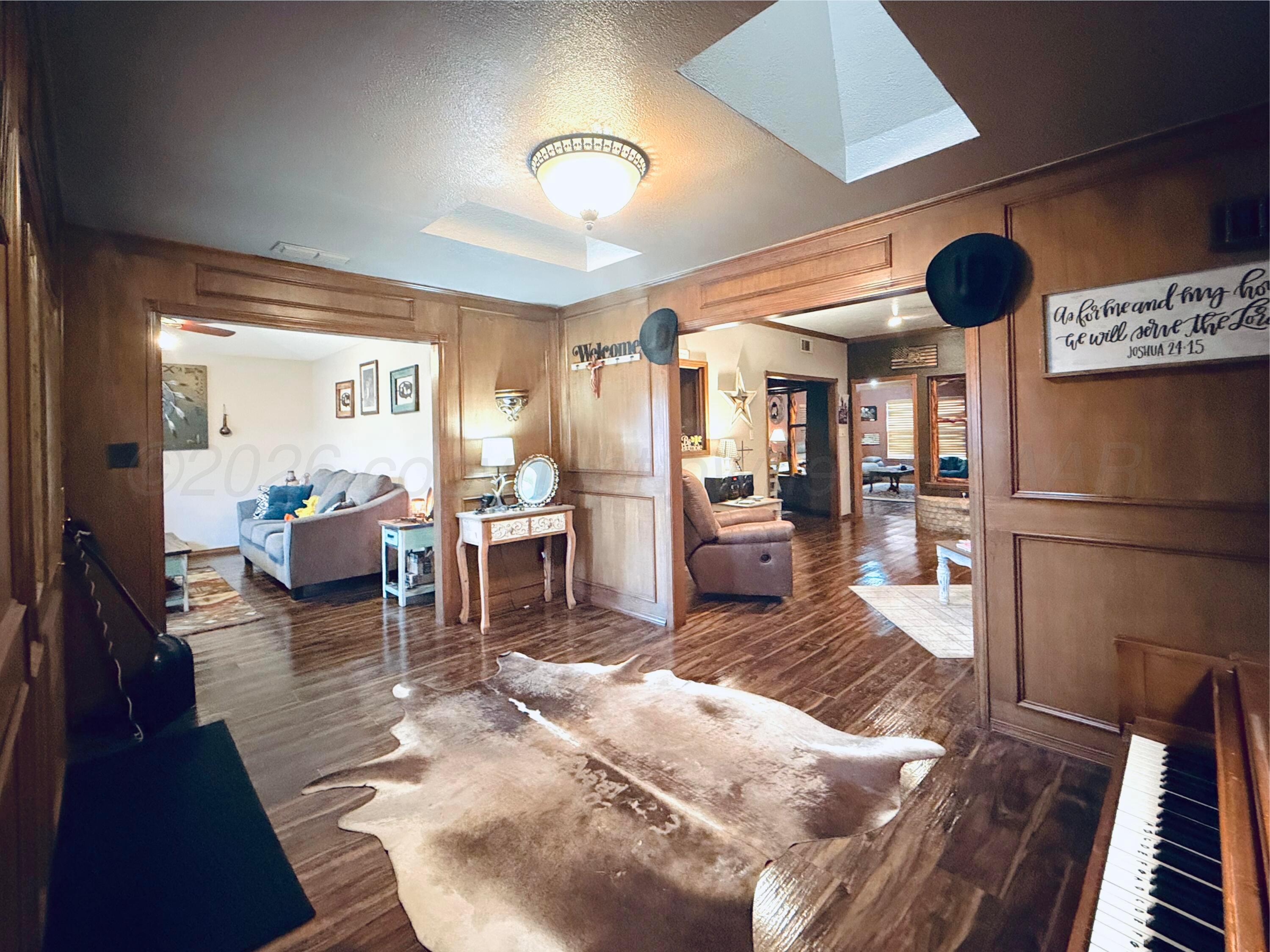 2005 Lister Street Borger, TX 79007 - Photo 3 of 20 a living room with lots of furniture and a large window