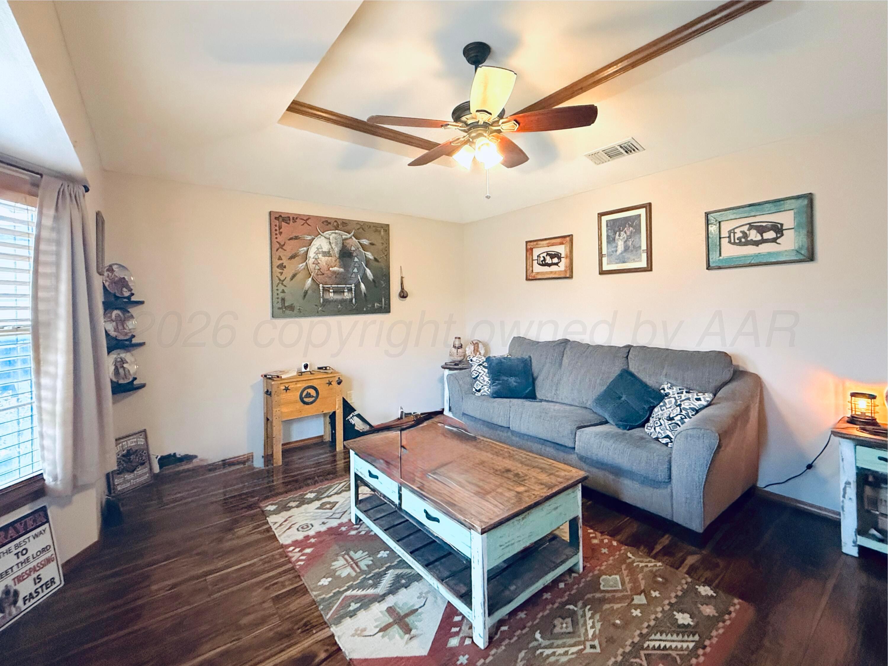 2005 Lister Street Borger, TX 79007 - Photo 4 of 20 a living room with furniture and a wooden floor