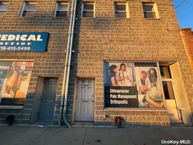 243-35 Merrick Boulevard, Unit 2 Queens, NY 11422 - Photo 1 of 1 a brick building with a door and a window