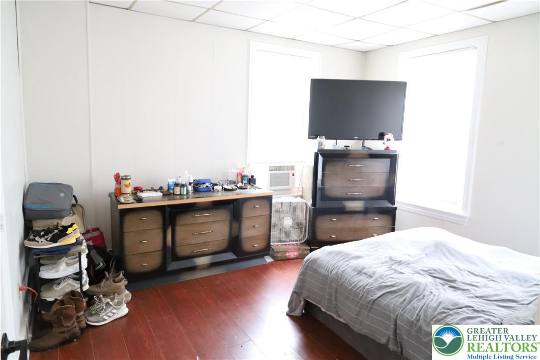 413 Pawnee Street Bethlehem, PA 18015 - Photo 11 of 16 a bedroom with a bed and a television