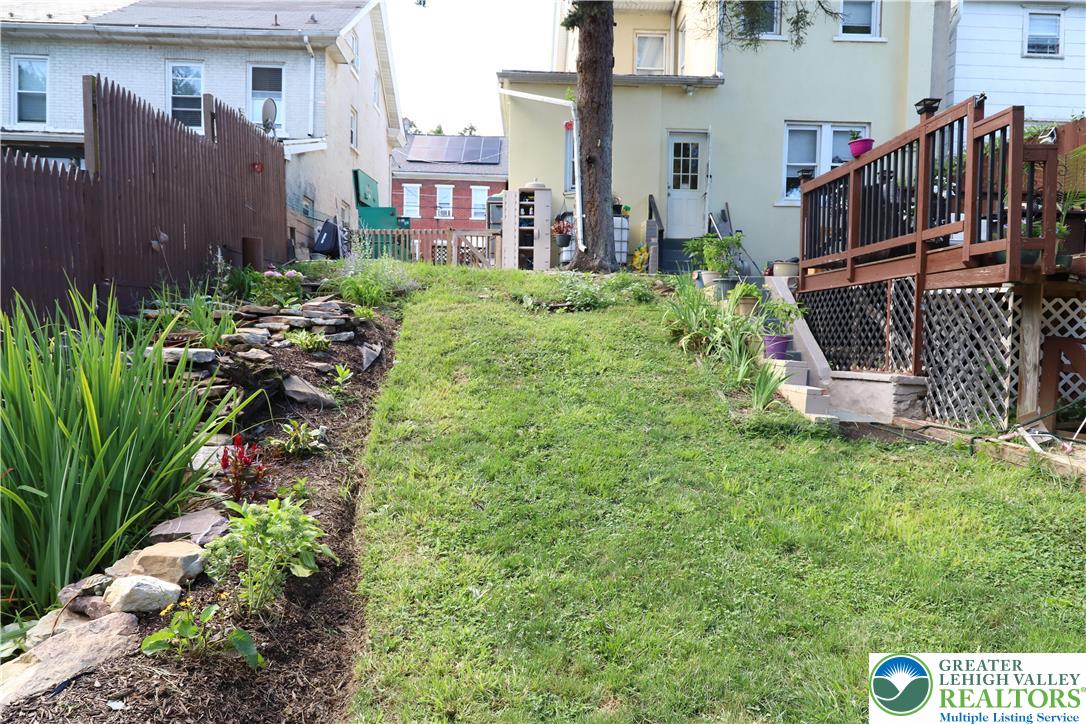 413 Pawnee Street Bethlehem, PA 18015 - Photo 15 of 16 a view of a house with a backyard and plants