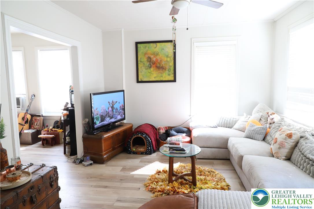 413 Pawnee Street Bethlehem, PA 18015 - Photo 3 of 16 a living room with furniture and a couch