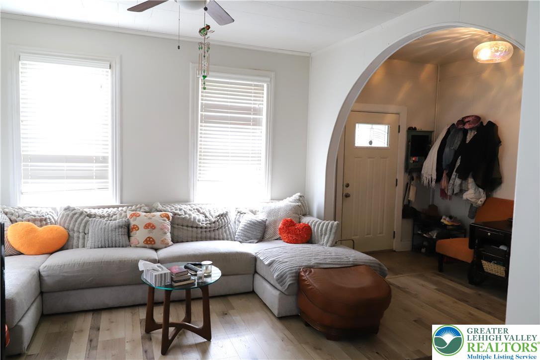 413 Pawnee Street Bethlehem, PA 18015 - Photo 4 of 16 a living room with furniture and a window