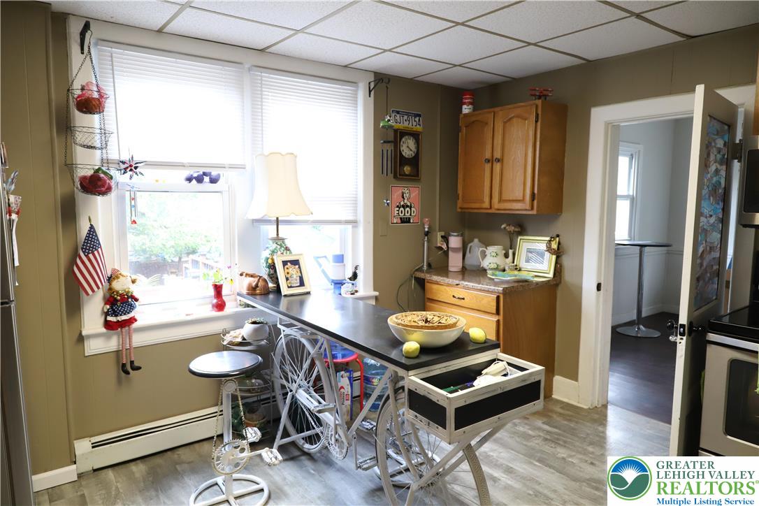 413 Pawnee Street Bethlehem, PA 18015 - Photo 8 of 16 a room with furniture and a window