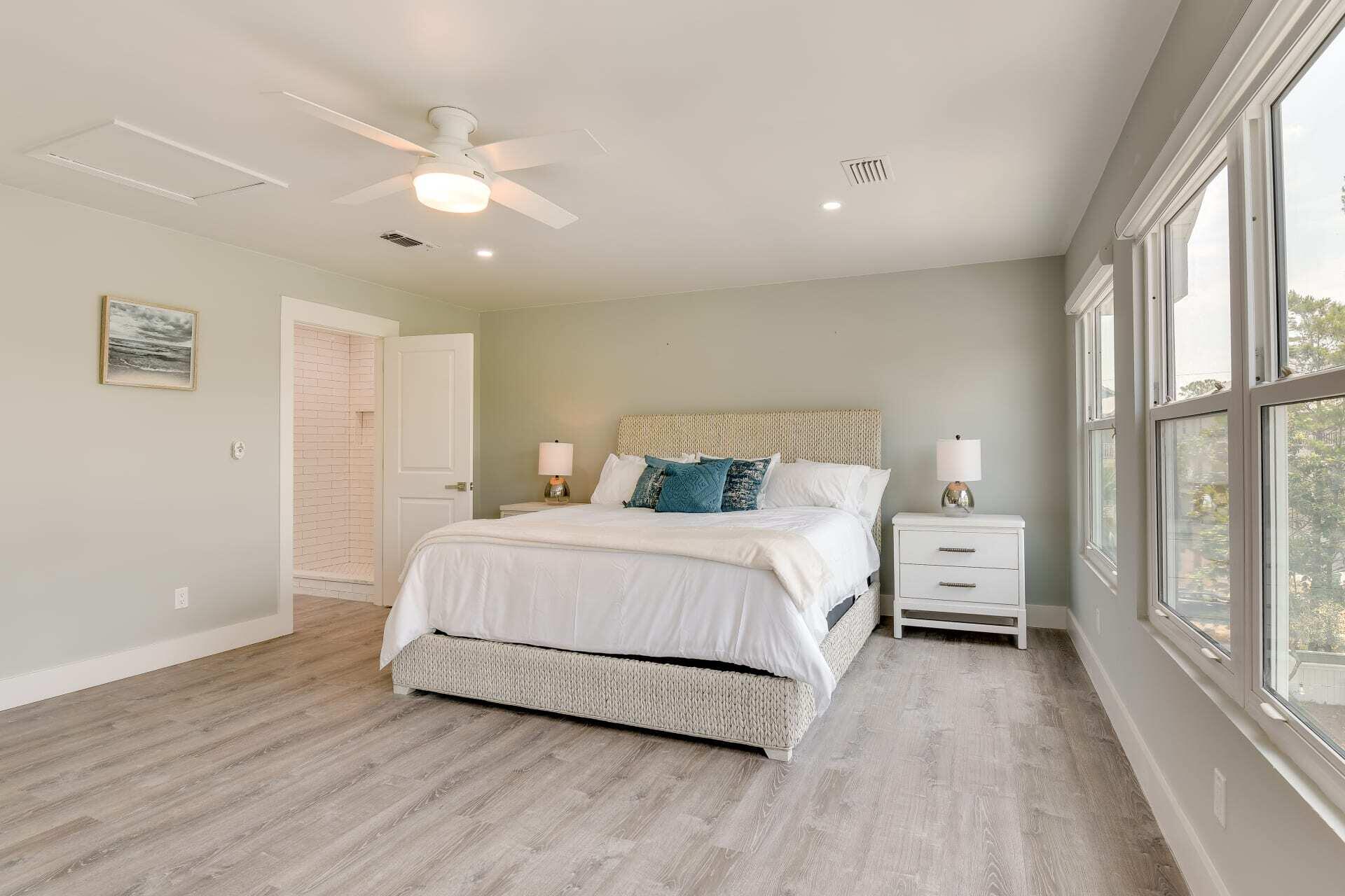 57 North Spooky Lane Santa Rosa Beach, FL 32459 - Photo 3 of 13 a bedroom with a large bed and a large window