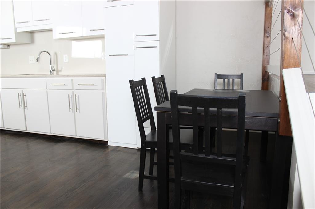 1124 Center Street Northwest Atlanta, GA 30318 - Photo 4 of 20 a view of a dining room with furniture and window
