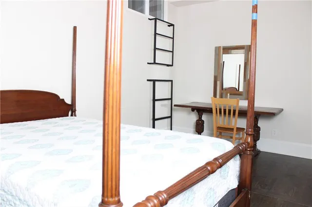 a kitchen view with table and chairs