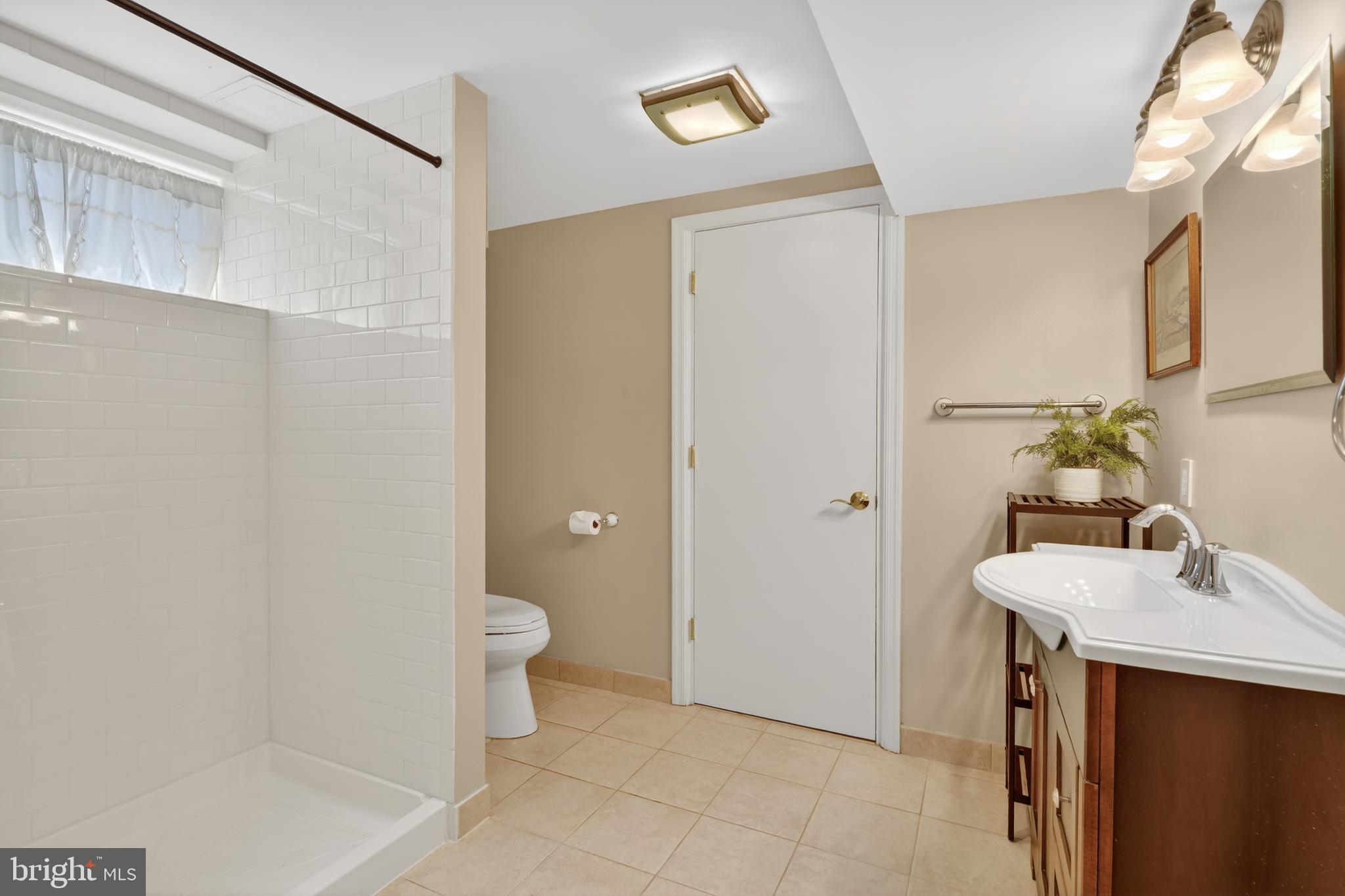 6727 Newington Road Lorton, VA 22079 - Photo 36 of 51 Large full bath on lower level