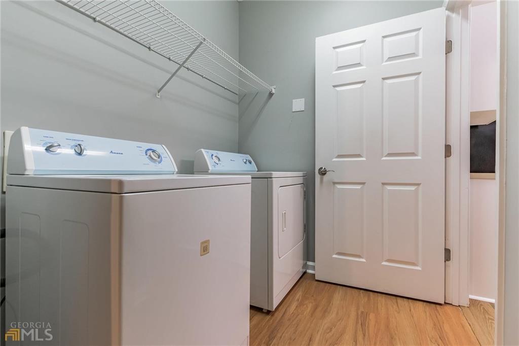 711 Spring Heights Lane, Unit 711 Smyrna, GA 30080 - Photo 20 of 30 a utility room with dryer and washer