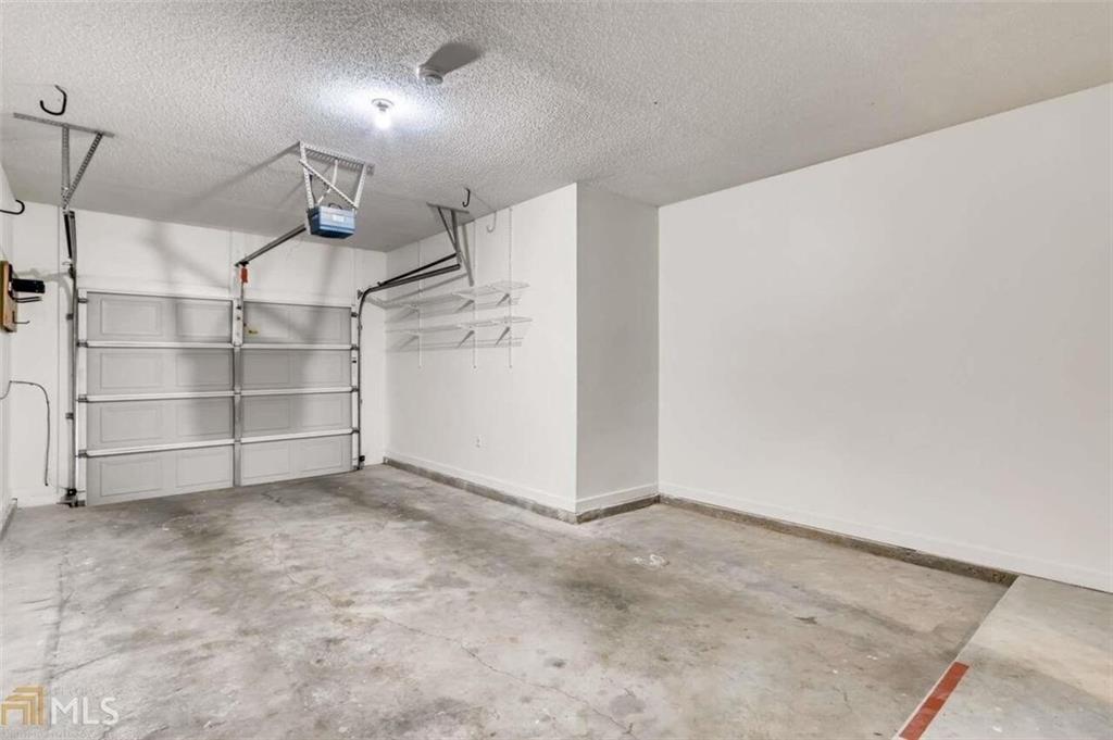711 Spring Heights Lane, Unit 711 Smyrna, GA 30080 - Photo 21 of 30 a view of a room with shelf