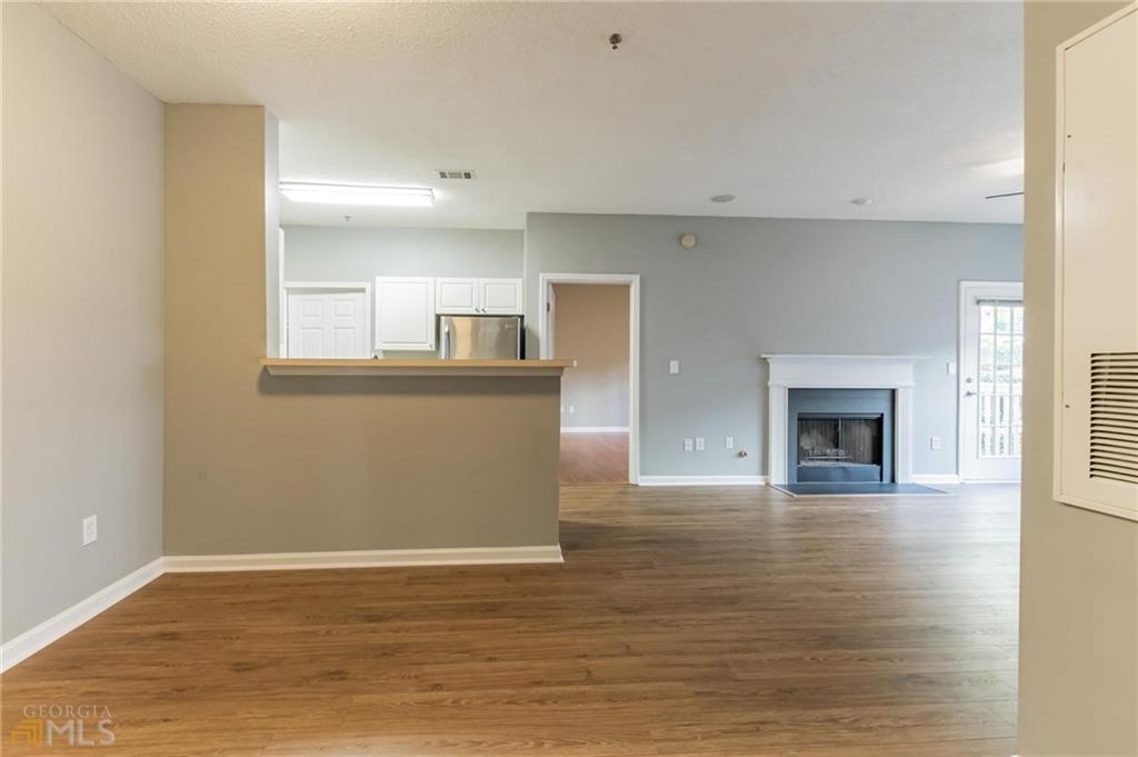 711 Spring Heights Lane, Unit 711 Smyrna, GA 30080 - Photo 3 of 30 a view of a livingroom with a fireplace