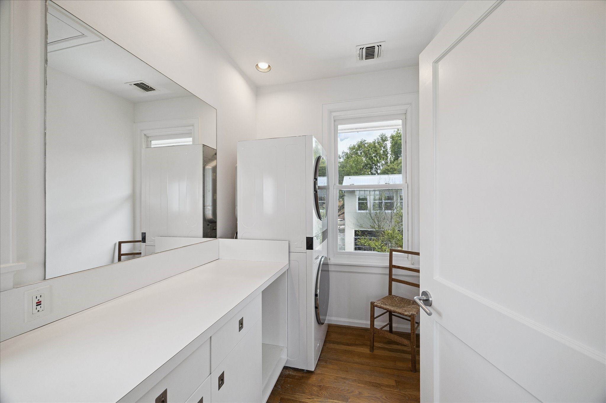 1418 Kipling Street Houston, TX 77006 - Photo 22 of 42 Another view of the primary bathroom. With its nice clean lines, it would be simple to upgrade the countertop with Quartz and add a sink, if one desired to do so. Stackable full-size LG Washer/Dryer stays with home.