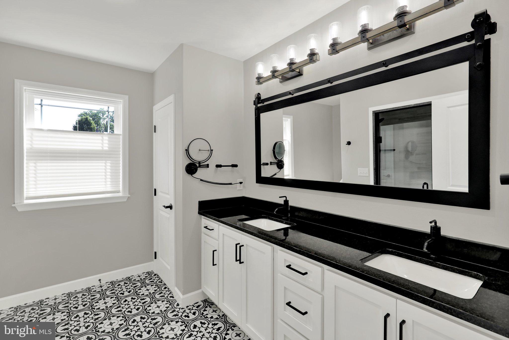 64 Middletown Road Fleetwood, PA 19522 - Photo 21 of 54 a bathroom with a sink and a mirror