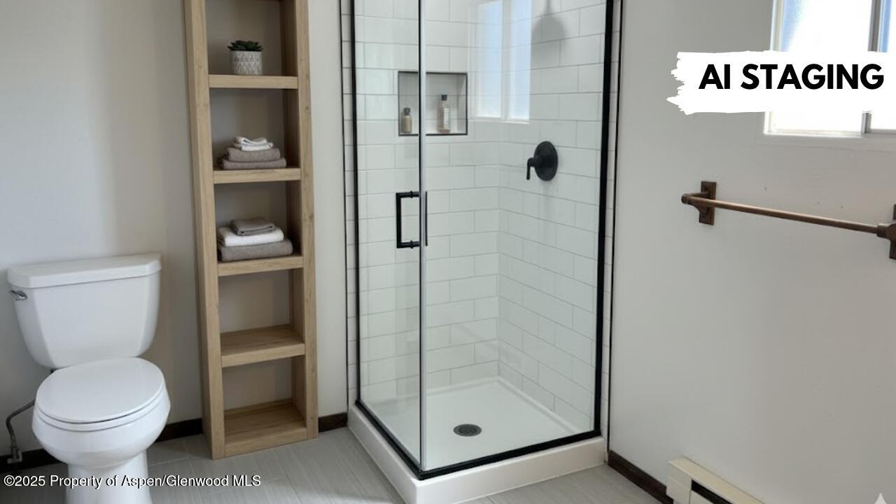 420 West 16th Street Rifle, CO 81650 - Photo 14 of 37 a bathroom with a toilet and a shower