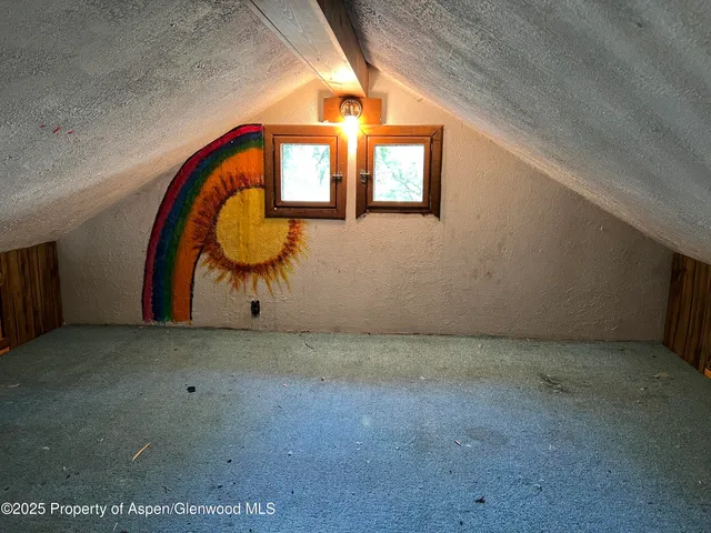 a room with a chair and a table
