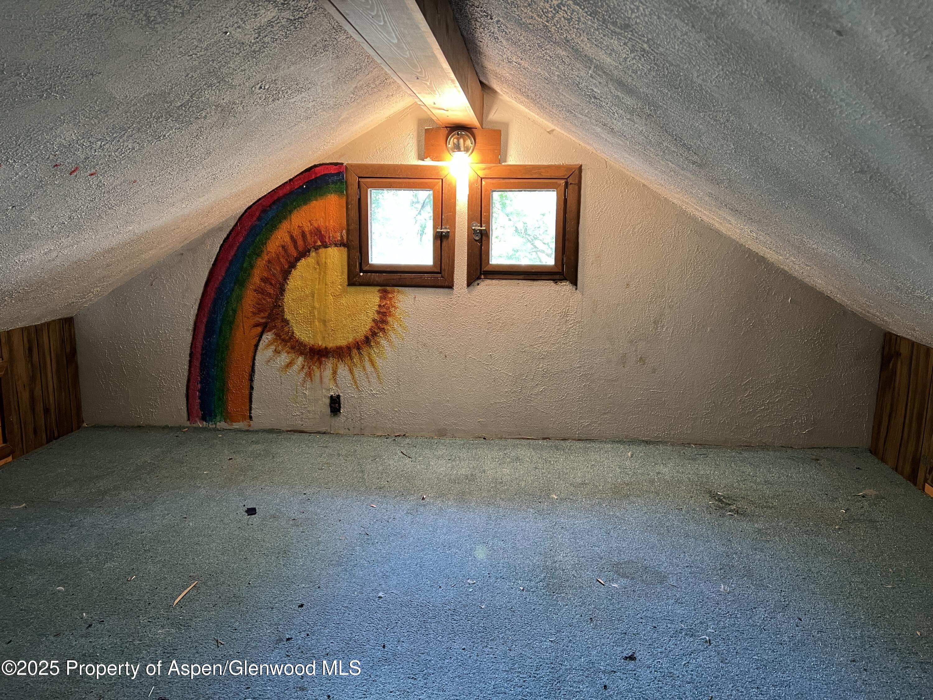 420 West 16th Street Rifle, CO 81650 - Photo 16 of 37 a view of a livingroom with a staircase
