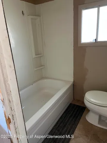 a view of a wooden fence