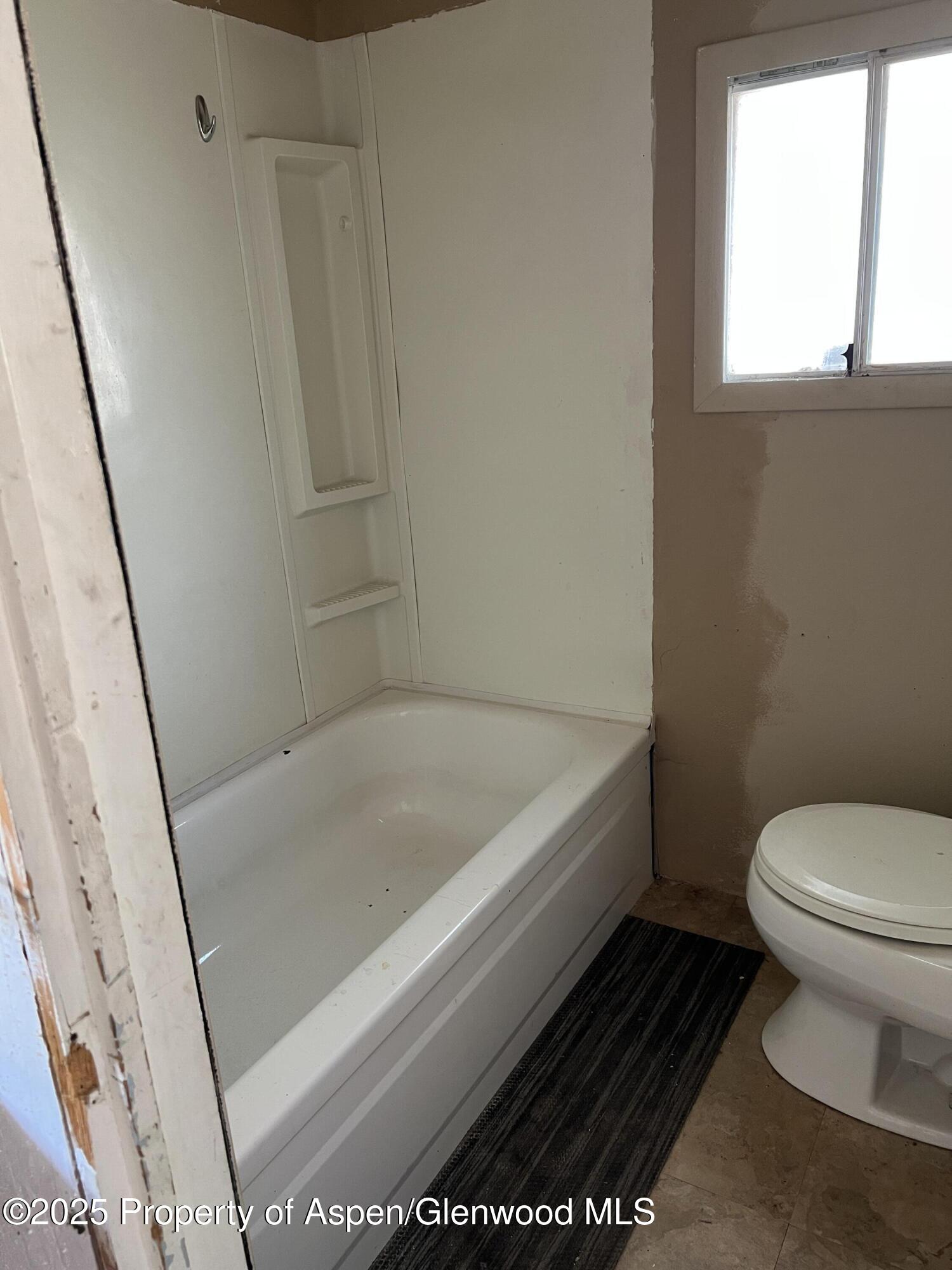 420 West 16th Street Rifle, CO 81650 - Photo 25 of 37 a bathroom with a sink and a toilet