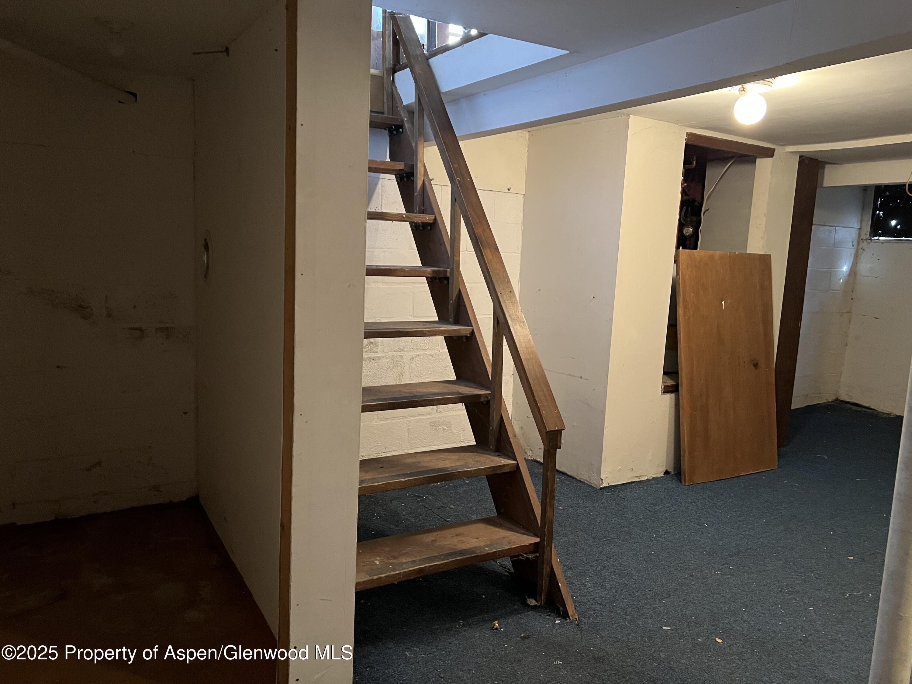 420 West 16th Street Rifle, CO 81650 - Photo 28 of 37 a view of entryway with wooden floor and stairs
