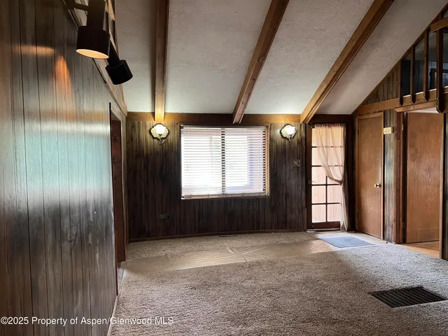 a view of empty room with windows