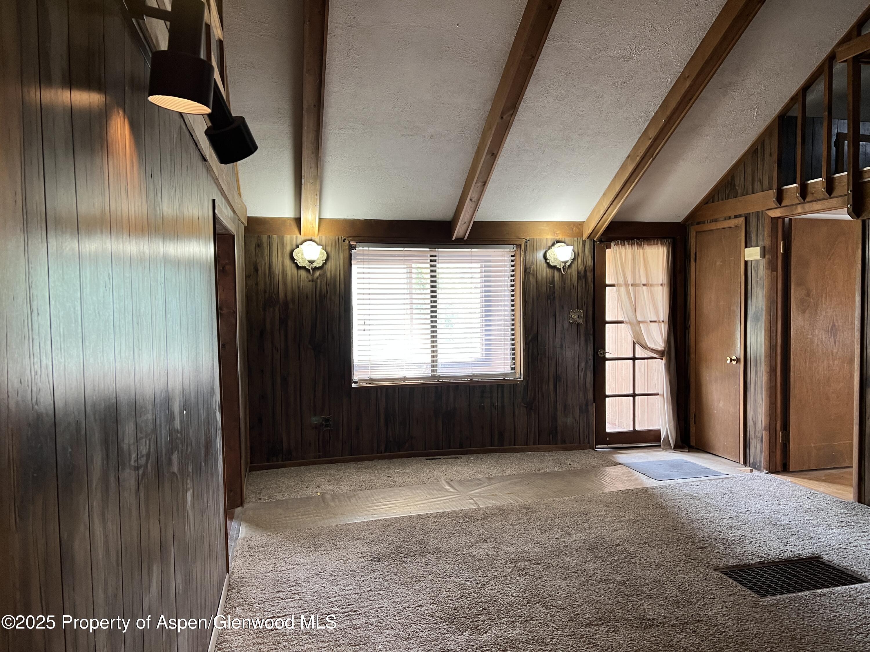 420 West 16th Street Rifle, CO 81650 - Photo 4 of 37 a view of empty room with windows