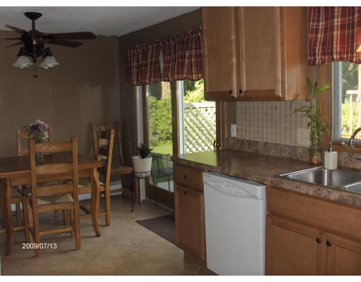 1043 Tinkham Road Wilbraham, MA 01095 - Photo 5 of 18 a kitchen with kitchen island granite countertop a sink cabinets and appliances