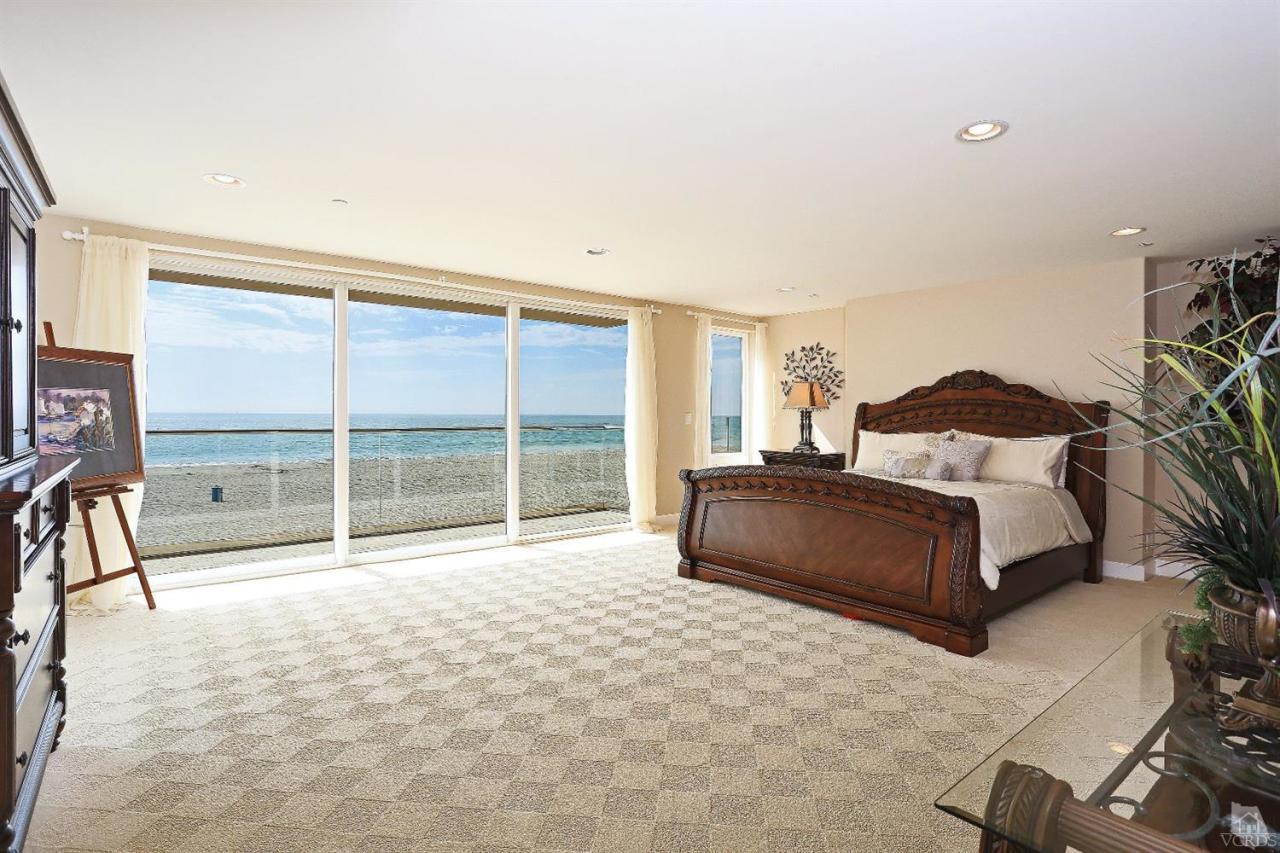 761 Mandalay Beach Road Oxnard, CA 93035 - Photo 22 of 32 a bedroom with a large bed and a large window