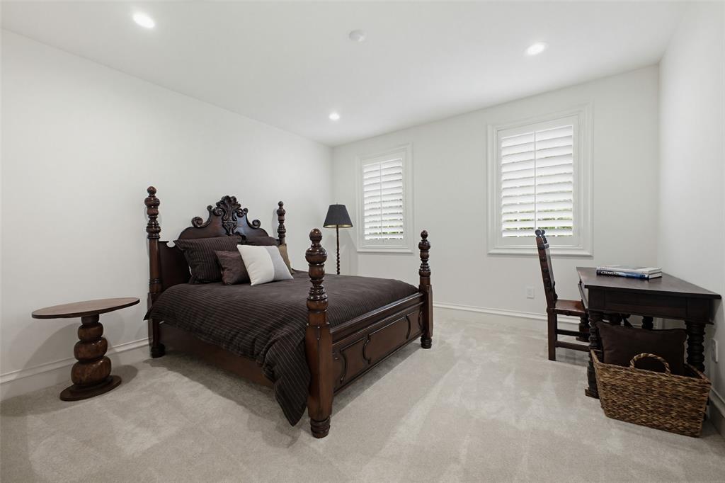 6622 Norway Road Dallas, TX 75230 - Photo 25 of 40 a bed room with two bed and a lamp