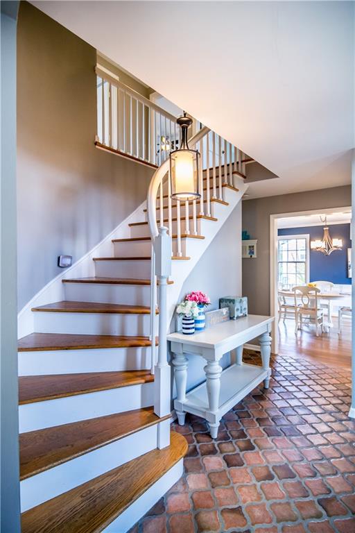 2332 Mill Grove Road Pittsburgh, PA 15241 - Photo 2 of 25 Beautiful curved staircase & Mediterranean tile beckon you inside