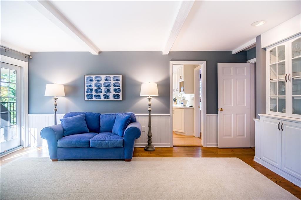2332 Mill Grove Road Pittsburgh, PA 15241 - Photo 6 of 25 Family room with brick fireplace, built-ins, sliding doors to walk out level yard, opens up to living room, kitchen & foyer