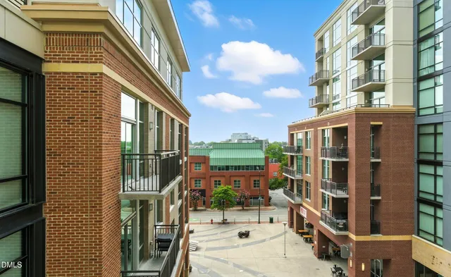a city street lined with tall buildings