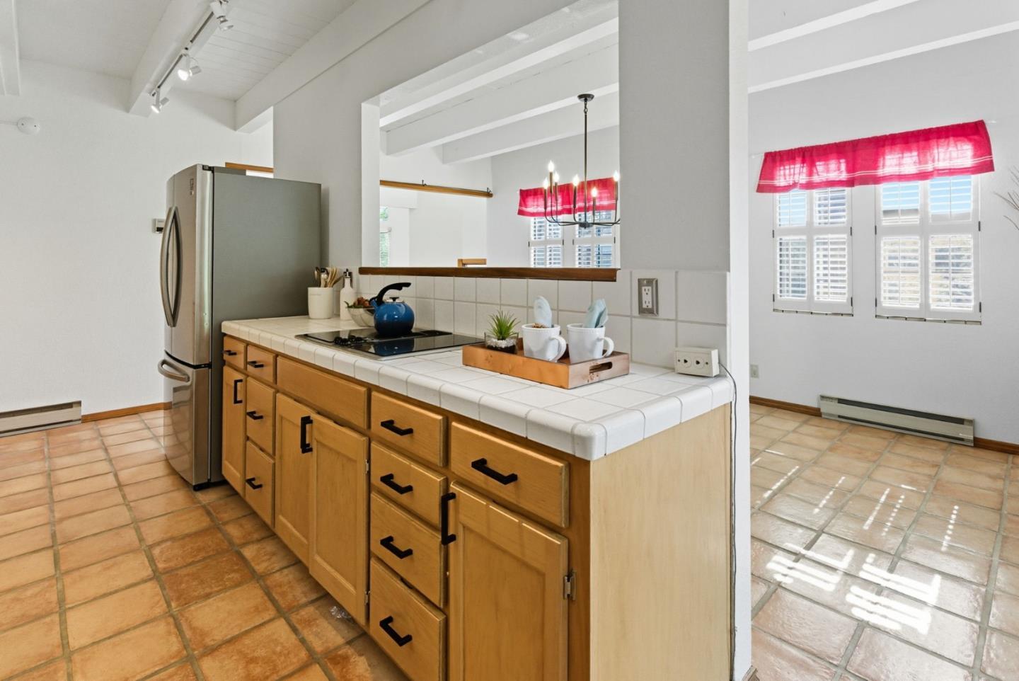 600 Nicasio Way Soquel, CA 95073 - Photo 12 of 47 a kitchen with granite countertop a sink cabinets and stainless steel appliances