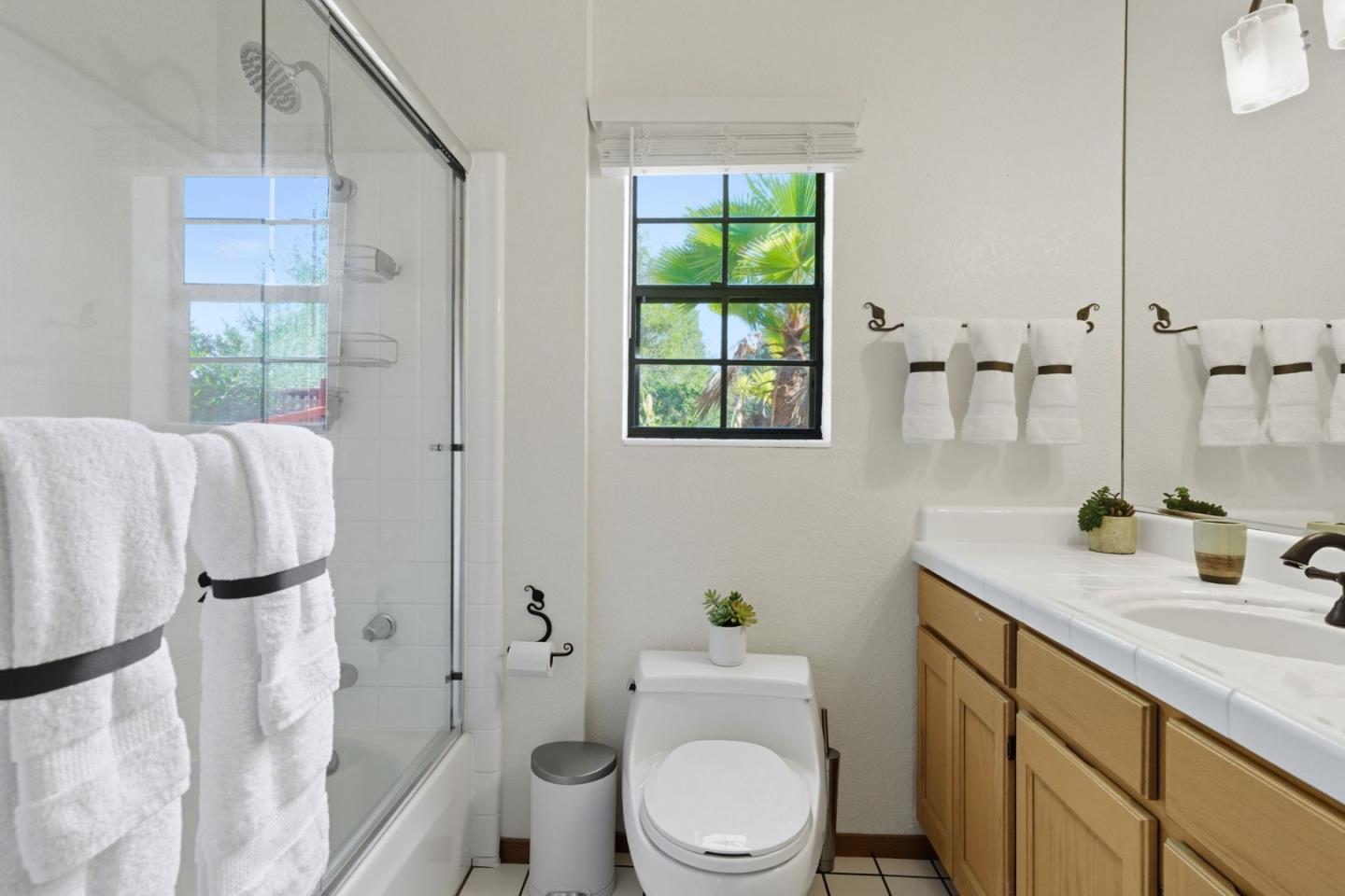 600 Nicasio Way Soquel, CA 95073 - Photo 26 of 47 a bathroom with a granite countertop toilet sink and mirror