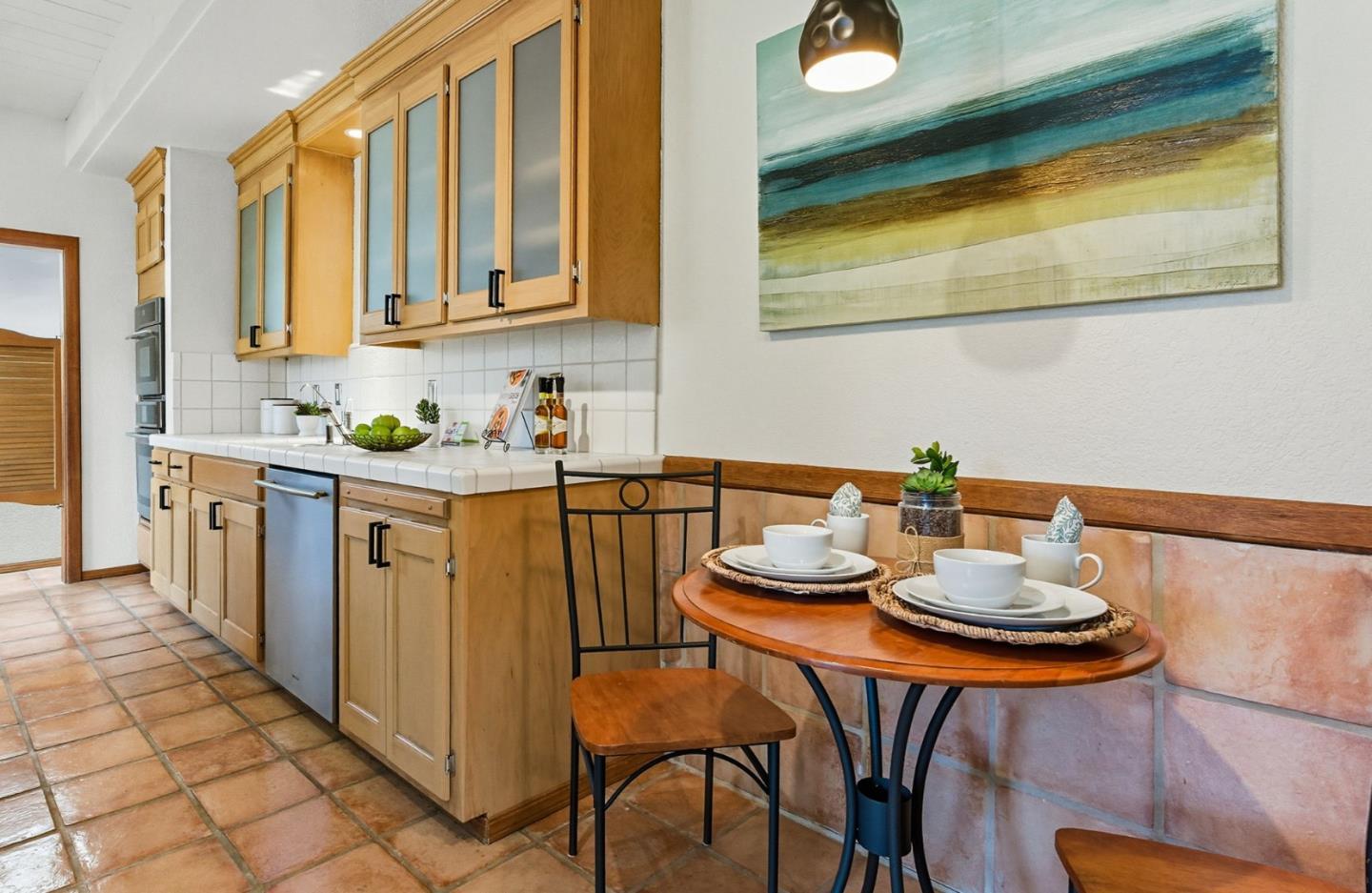 600 Nicasio Way Soquel, CA 95073 - Photo 10 of 47 a kitchen with stainless steel appliances granite countertop a sink and cabinets