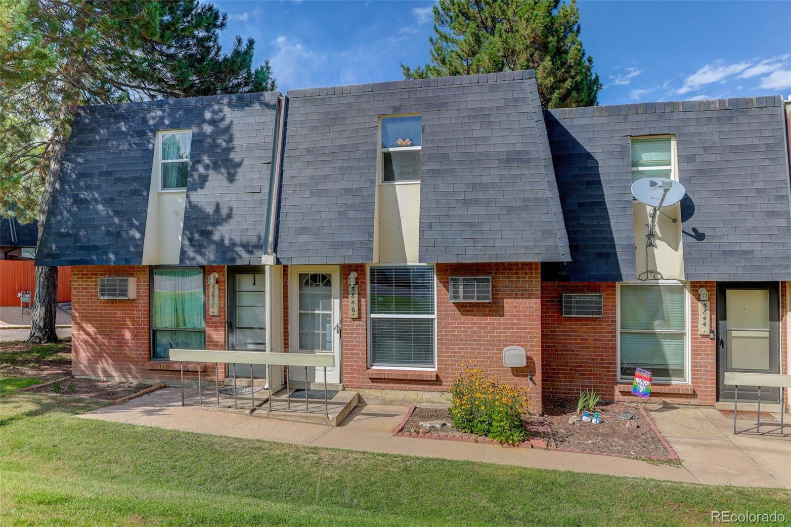 5846 South Pearl Street Centennial, CO 80121 - Photo 20 of 32 front view of a house with a yard