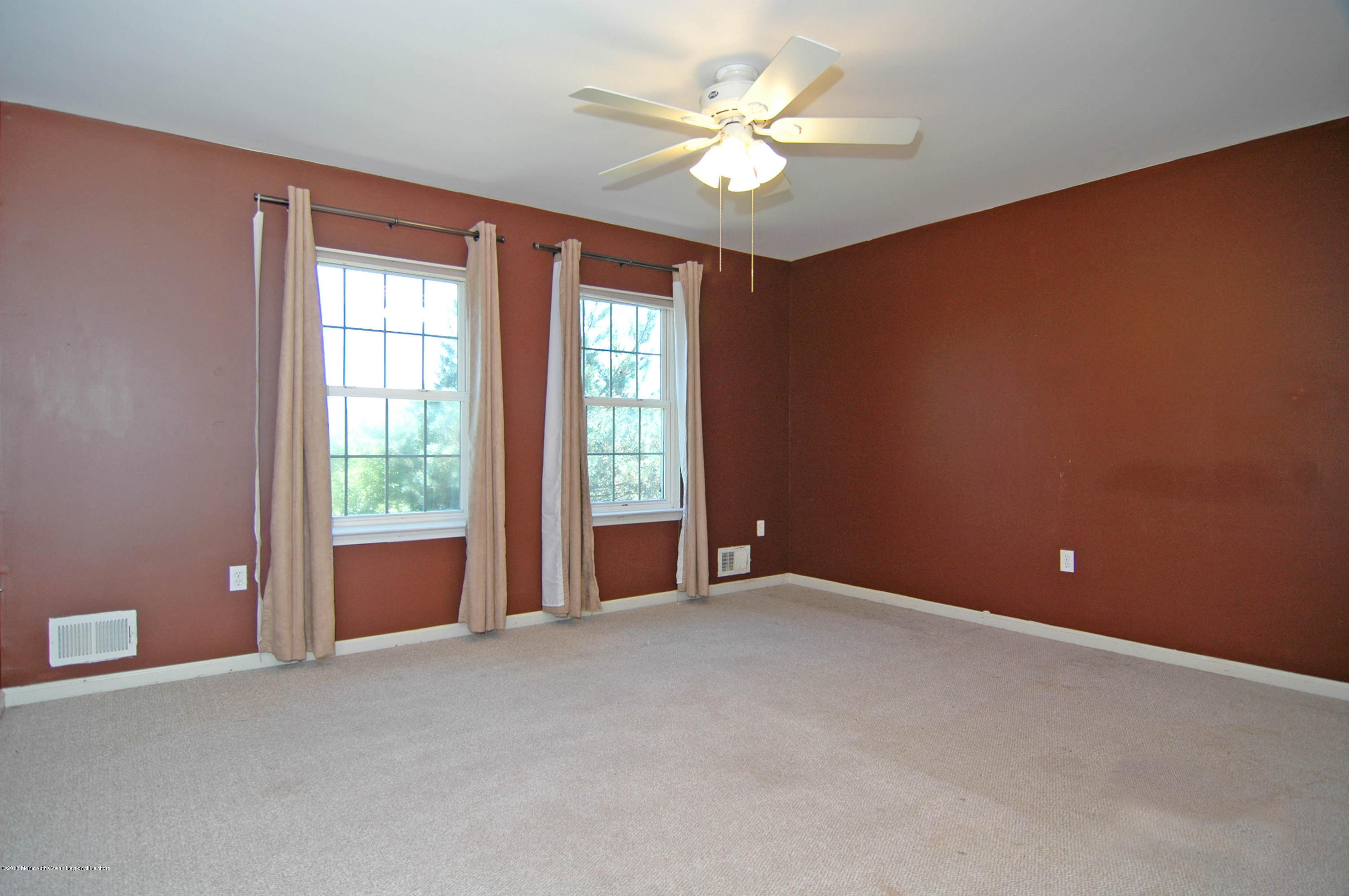 76 Mill Pond Road Jackson, NJ 08527 - Photo 14 of 23 a view of an empty room with a window